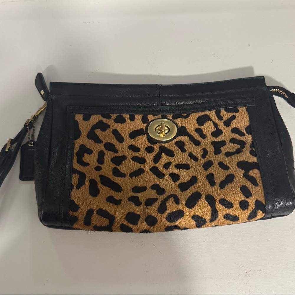 Coach Haircalf Large Clutch style #f49871
Excellent condition